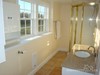 Upstairs bathroom is bright and airy